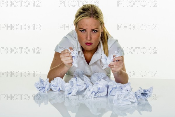Young woman in the office is overwhelmed with work. burnout syndrome at work or study. Austria