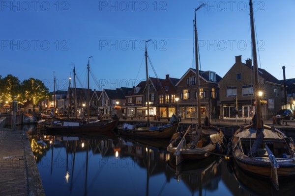Evening mood, blue hour, old harbour at the Eemmeer, historic centre of Spakenburg, Bunschoten-Spakenburg, Utrecht, Netherlands