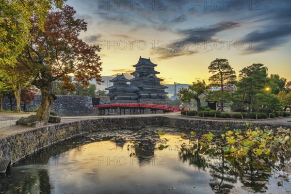 Matsumoto Nagano Japan, sunrise city skyline at Matsumoto Castle with autumn foliage season
