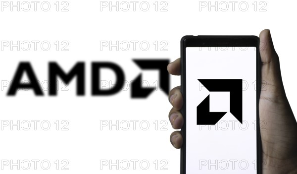 AMD logo displayed on smartphone screen. Advanced Micro Devices, Inc. is an American multinational corporation and semiconductor company.