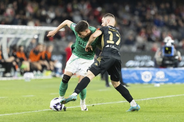 MELBOURNE, AUSTRALIA, MAY 24: Ben Parkinson of Newcastle United competes with Benjamin Garuccio of A-League All Stars Men during the Global Football Week at Marvel Stadium on May 24, 2024 in Melbourne, Australia, Oceania