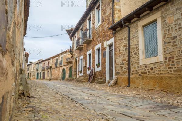 Castrillo de los Polvazares, Leon, Spain, May 2018: view on the streets and traditional stone houses of this historical village, one of the few places of the ?Maragatería? which still keeps its traditions, Europe
