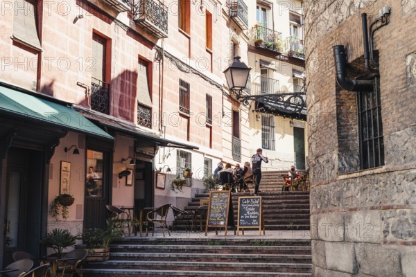 Madrid, Spain, October 11, 2020: Cozy bar in the steps of Travesia del Nuncio Street in central Madrid, Europe