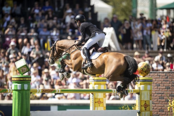 Scott Brash of Great Britain and riding Hello Jefferson compete in the first round of the 1.60m CPKC International during the Spruce Meadows Masters, presented by Rolex, in Calgary, Alberta, Canada, North America
