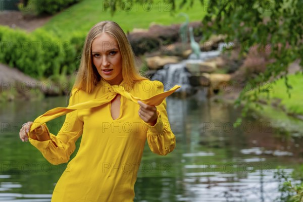 A Beautiful Blonde Model Poses Outdoors In Her Fall Clothes, Charlotte, United States of America