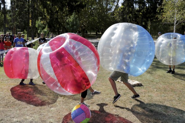 Sofia, Bulgaria - September 24, 2016: Boys are playing bubble football game in the park