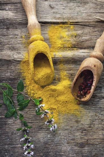 Set of different spices on the old wooden table.Photo rustic