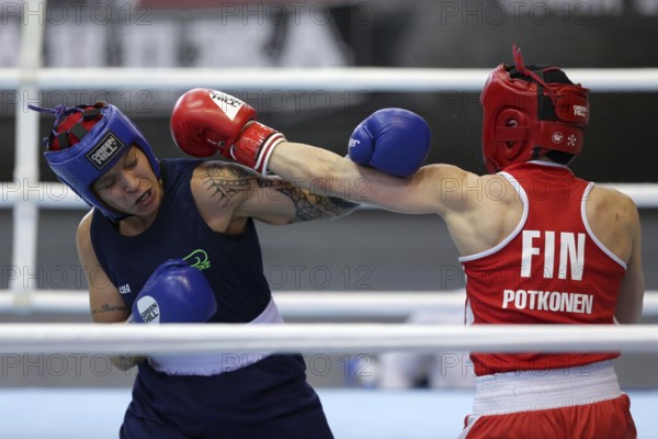 Sofia, Bulgaria. 27th February, 2021. Mira Potkonen (red) of Finland and Beatriz Ferreira of Brazil fight in their final round of Light Welter (W60kg) category of the 72-nd International Boxing Tournament Strandja 2021, Sofia, Bulgaria, Europe