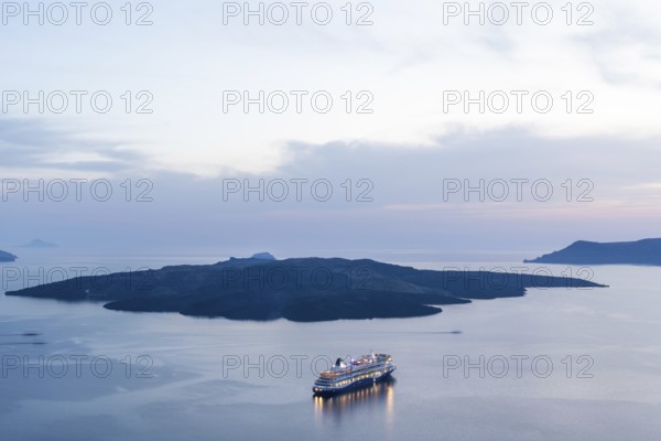 Evening atmosphere, view from Fira, cruise ship in the archipelago of Santorini, Cyclades, Greece, Europe