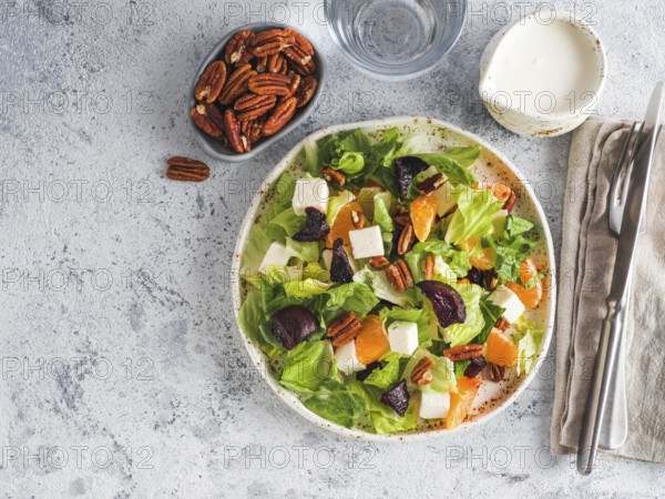 Beetroot, Feta Cheese and Orange Salad. Close up. Top view or flat-lay. Copy space for text. Gray concrete background