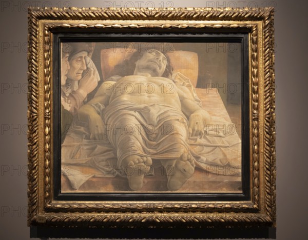 Milan, Italy, 23 September 2023: Brera antique painting museum. Lamentation over the Dead Christ, by Andrea Mantegna, 1483, Europe