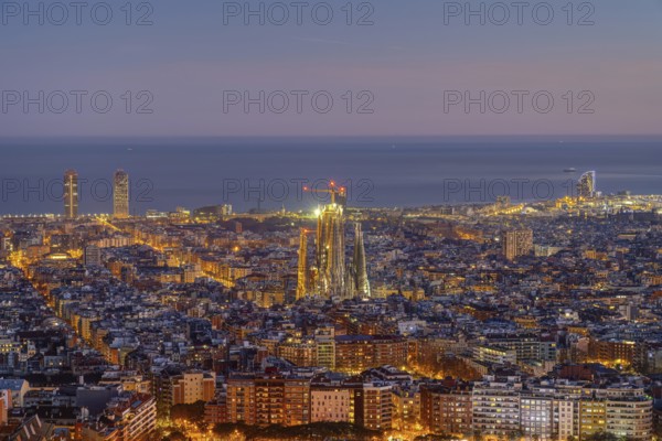 The Barcelona skyline with the famous Sagrada Familia at dusk