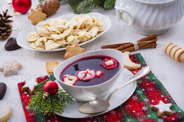 Barszcz (beetroot soup) with small pierogi