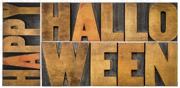 Happy Halloween banner or greeting card - isolated word abstract in vintage grunge letterpress wood type