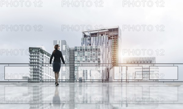 Young businesswoman in suit at balcony against morning cityscape background