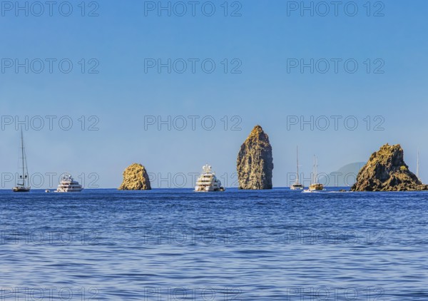 Faraglioni, Pietra Lunga and Pietra Menalda rock formations off the island of Lipari in Sicily, Italy, Europe