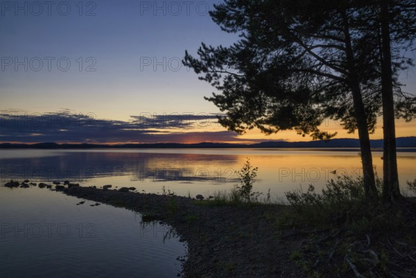 Sunset at the Orsasjon lake near the Swedish town Orsa in the county Dalarna
