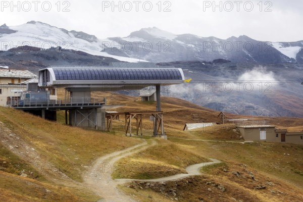 Zermatt, Switzerland Cable car station in autumn and mountains view