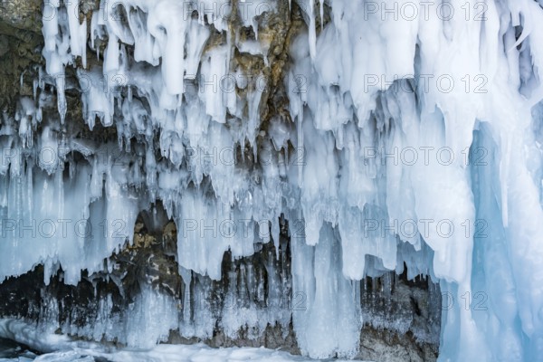 View of icicles in ice cave at Frozen Baikal Russia, during winter