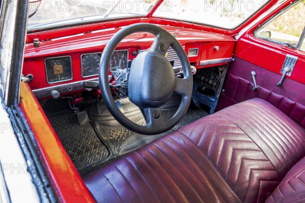 Cuba, Caribbean, South America. Vintage cars on the roads of Austria, Central America