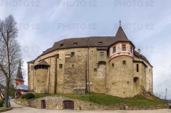 Loket Castle is a 12th-century Gothic style castle about 12 kilometres from Karlovy Vary on a massive rock in the town of Loket, Czech Republic, Europe