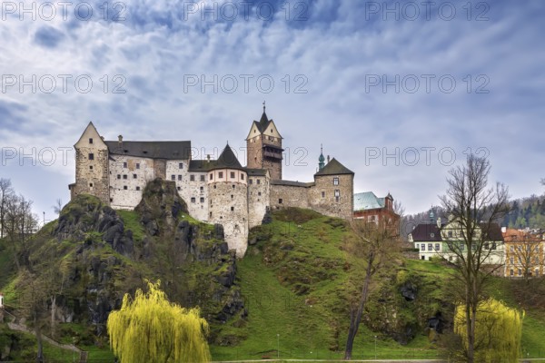 Loket Castle is a 12th-century castle about 12 kilometres from Karlovy Vary on a massive rock in the town of Loket, Czech Republic, Europe