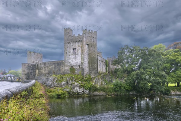 Cahir Castle is one of the largest castles in Ireland, is sited on an island in the river Suir