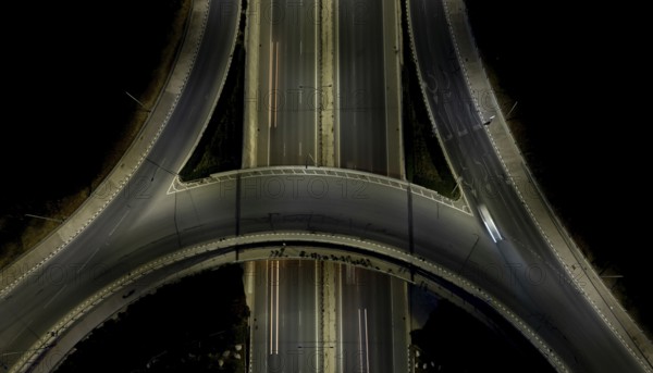 Aerial drone top view of a modern motorway junction roundabout with cars moving fast. Transportation infrastructure, Nicosia Cyprus