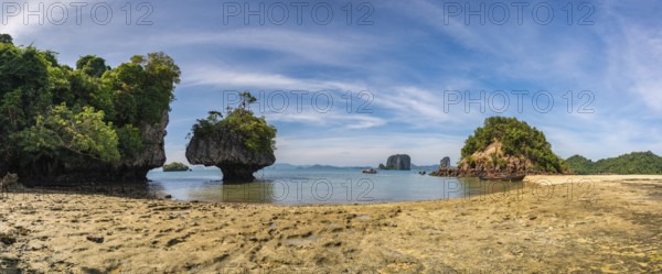 Tropical islands view with ocean blue sea water and white sand beach at Koh Phak Bia, Krabi Thailand nature landscape panorama