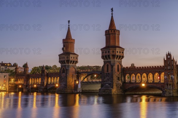 The beautiful Oberbaum Bridge over the Spree in Berlin at dusk