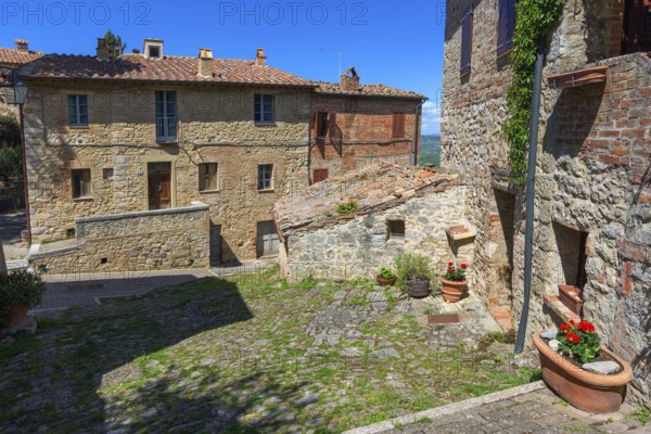 Street and houses in old medieval Italy town