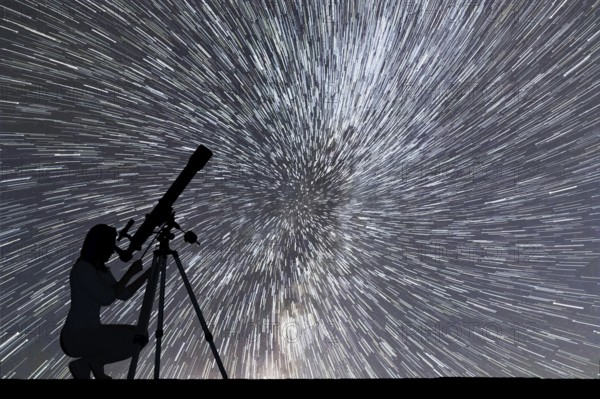 Girl looking at the stars with telescope. Starry night sky