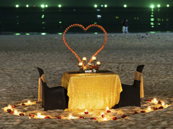 Table and chairs, illuminated and decorated, romantic, Chenang Beach, Langkawi, Kedah State, Malaysia, Southeast Asia, Asia