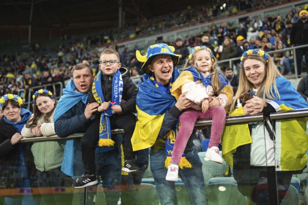 WROCLAW, POLAND - MARCH 26, 2024: Qualifications for UEFA Euro 2024. Final play-off match Ukraine - Iceland 2:1. Supporters of Ukraine
