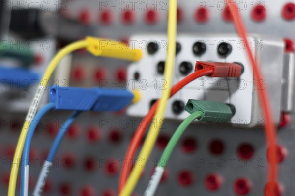 Close-up of a control circuit with coloured cables