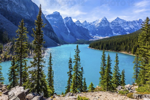 Lake Moraine with water of emerald color in the Valley of the Ten Peaks. Park Banff, Canadian Rockies, Province of Alberta. The concept of ecological, photographic and active tourism