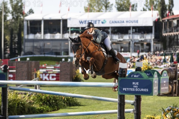 Jaydan Stettner of Canada and riding Ielinea JTL competes in the 1.45m Enbridge Cup at the Spruce Meadows, Masters, in Calgary, Alberta, Canada, North America