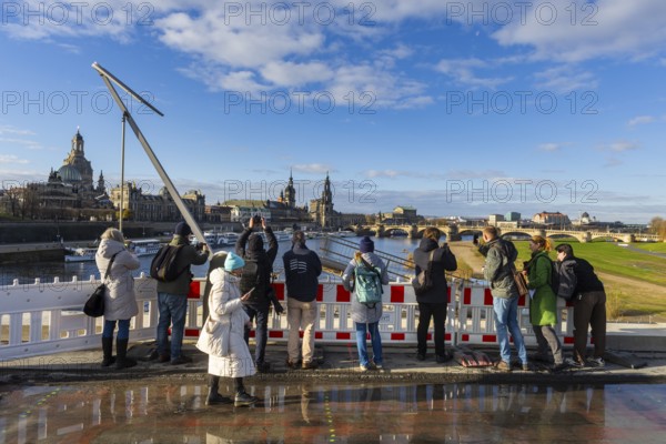 Partial collapse of the Carola Bridge. Over a length of around 100 metres, the section on which the trams normally run has collapsed into the Elbe. The demolition of the section is in full swing. Dresden, Saxony, Germany, Europe