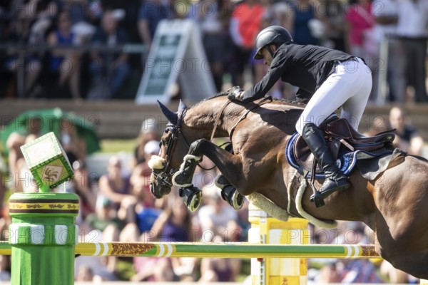 Sameh El Dahabn of Great Britain and riding WKD Toronto compete in the first round of the 1.60m CPKC International during the Spruce Meadows Masters, presented by Rolex, in Calgary, Alberta, Canada, North America