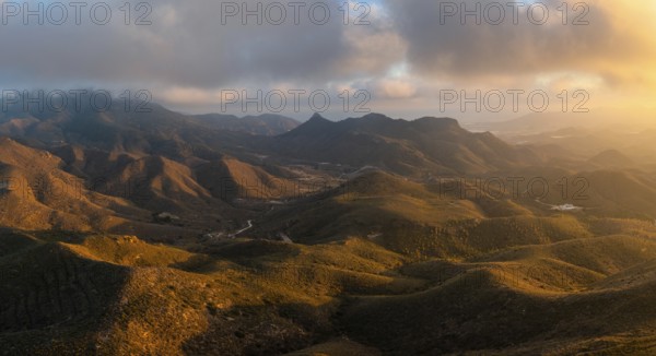 Drone landscape of semi-desert mountain landscape in southern Spain at sunset