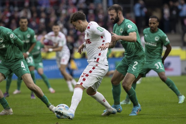 Andreas Dick (DFL/DFB REGULATIONS PROHIBIT ANY USE OF PHOTOGRAPHS AS IMAGE SEQUENCES AND/OR QUASI-VIDEO), RheinEnergieStadion, Cologne, North Rhine-Westphalia, Luca Waldschmidt (1.FC Köln, forward, #9), Simon Asta (SpVgg Greuther Fürth, defence, #2), 2nd Bundesliga, 1.FC Köln, SpVgg Greuther Fürth on 09.11.2024 at the RheinEnergieStadion in Cologne Germany