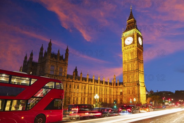 Big Ben Clock Tower with London Bus sunset in England