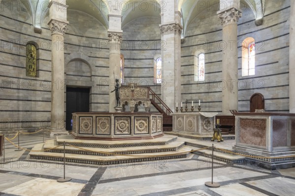 Pisa, Italy, 29 June 2023: Baptistery interior, basilica altar, catholic church. Italy travel destination, Europe