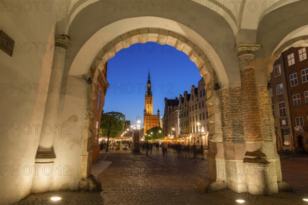 View of the old town of Gdansk with the Main Town Hall through the arch of Green Gate, Poland, Europe