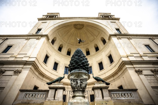 Monumental pine cone fountain with sculptures in an inner courtyard of the Vatican, Rome