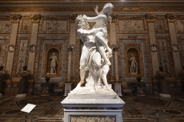Rome, Italy, 28 December 2023: The Rape of Proserpina by Gian Lorenzo Bernini, 1622. Baroque marble sculpture in Galleria Borghese, Europe
