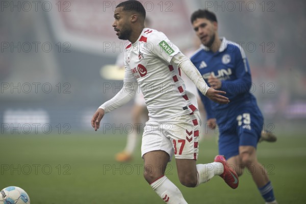 (DFL/DFB REGULATES PROHIBIT ANY USE OF PHOTOGRAPHS AS IMAGE SEQUENCES AND/OR QUASI-VIDEO), RheinEnergieStadion, Cologne, North Rhine-Westphalia, Linton Maina (1.FC Köln, Midfield, #37), Jonas Meffert (Hamburger SV, Midfield, #23), 2nd Bundesliga, 1.FC Köln, Hamburger SV on 09/02/2025 at RheinEnergieStadion in Cologne Germany