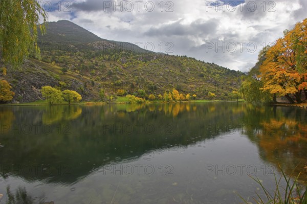 Small lake in city park of the French small town