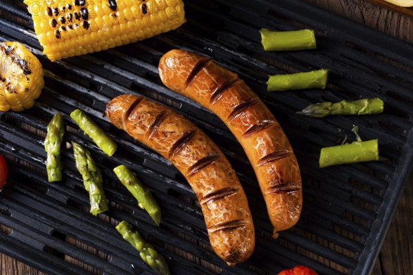 Grilled krakauer with french fries and green salad