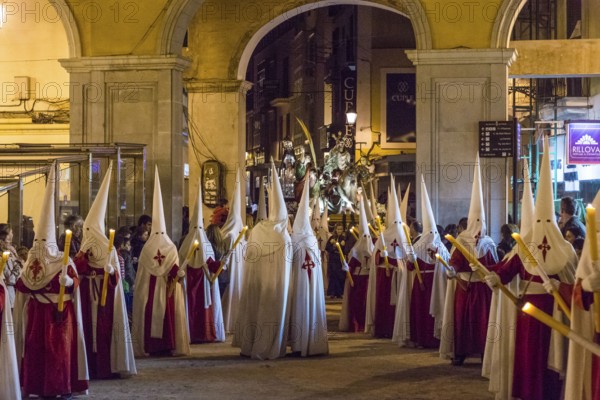 Hooded brothers, Holy Week in the Plaza Major, Holy Thursday procession, Palma, Mallorca, Balearic Islands, Spain, Europe